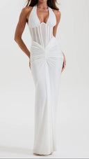 Woman wearing a white ruched maxi skirt, front view