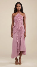 Woman wearing a dusty lilac asymmetric ruffle halter midi dress