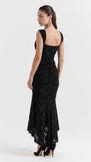 Woman wearing a black floral burnout fishtail midi dress