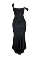 Woman wearing a black floral burnout fishtail midi dress