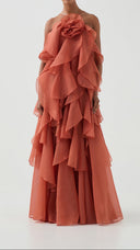 Isadora coral clay layered ruffle maxi dress, side view showing skirt volume