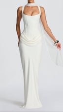 Odette ivory pleated corset maxi dress, side view showing cowl overlay skirt