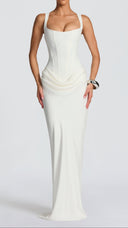 Odette ivory pleated corset maxi dress, angled view of skirt movement