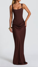 Odette plum brown pleated corset maxi dress, angled view of skirt movement