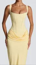 Odette lemon yellow pleated corset maxi dress, back view with lace-up corset detail